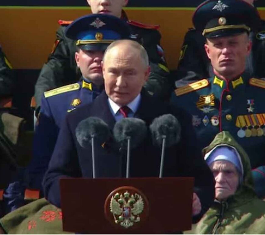 Russian President Vladimir Putin delivers a speech during a military parade on Victory Day