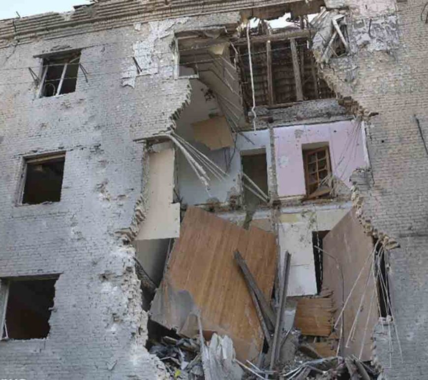 In this photo provided by the Ukrainian Emergency Service, a damaged apartment house is seen after Russia attacked the city with guided bombs overnight in Zaporizhzhia, Ukraine