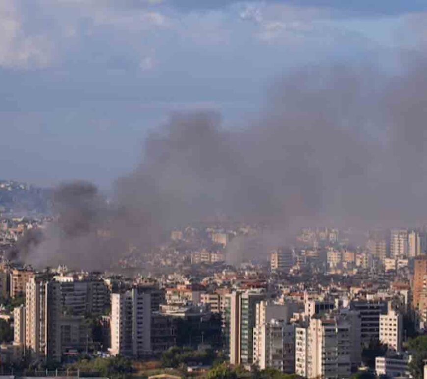 Smoke billows over Beirut, after overnight Israeli air strikes, as seen from Sin El Fil, Lebanon.