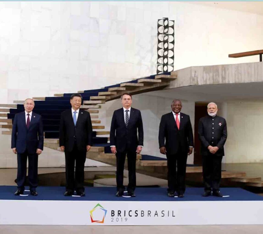 Russian President Vladimir Putin, Chinese leader Xi Jinping, then-Brazilian President Jair Bolsonaro, South African President Cyril Ramaphosa and Indian Prime Minister Narendra Modi pose as they arrive for the BRICS summit in Brasilia in November 2019.