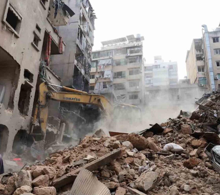 A machinery clears rubble at a site of an Israeli strike, amid ongoing hostilities between Hezbollah and Israeli forces, in Beirut, Lebanon.