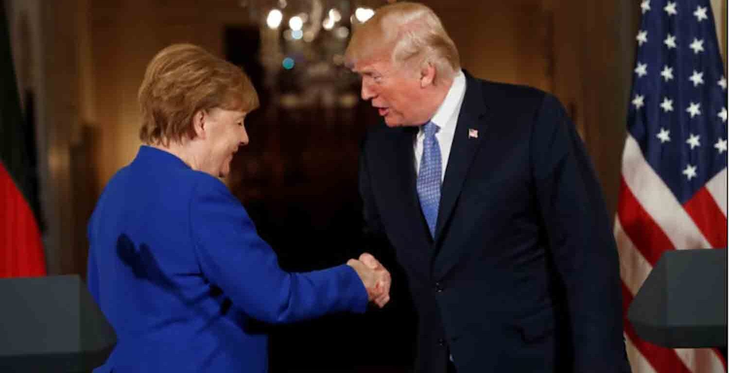 U.S. President Donald Trump greets Germany's Chancellor Angela Merkel after a joint news conference in the East Room of the White House in Washington, U.S., April 27, 2018.