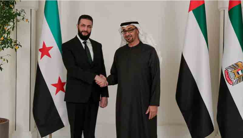 Syrian President Ahmed al-Sharaa shakes hands with UAE's President Sheikh Mohamed bin Zayed Al Nahyan, in Abu Dhabi, United Arab Emirates.