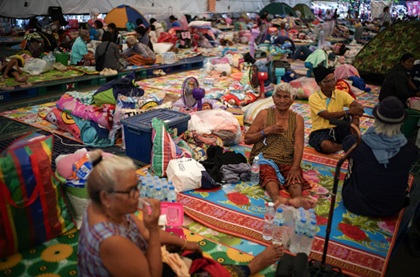 Displaced people gather inside a temporary shelter amid deadly clashes between Thailand and Cambodia Displaced people gather inside a temporary shelter amid deadly clashes between Thailand and Cambodia along a disputed border area, in Buriram province, Thailand.